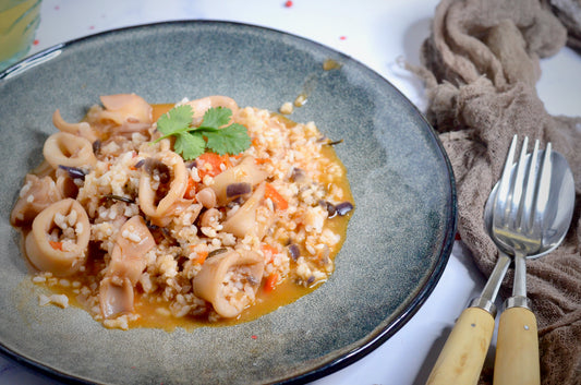 Arroz meloso con calamar al romero